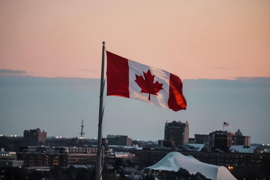 Canada met its goal of giving permanent residency to 401,000 foreigners in 2021 by focusing on temporary residents already in the country, according to Immigration Minister Sean Fraser.